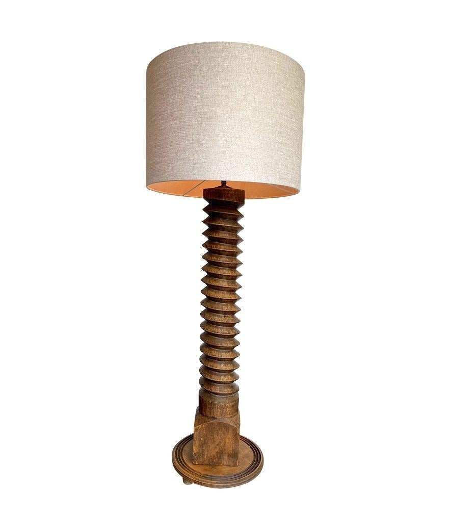 A French 1940s solid oak corkscrew floor lamp in the style of Charles Dudouyt 6