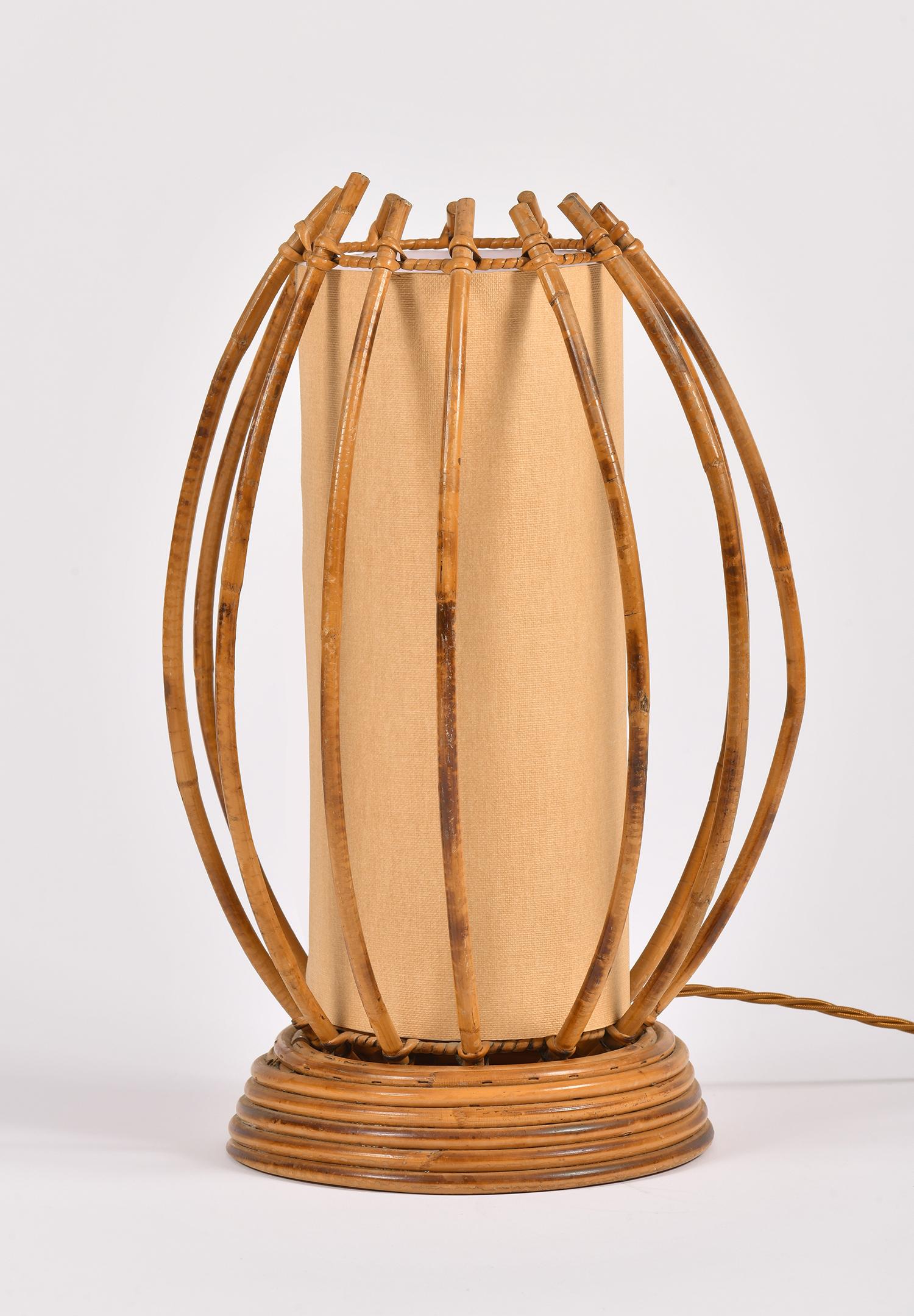 A bamboo and rattan table lamp
France, circa 1955.