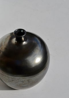 A French 1950s Black Glazed “Boule” Vase