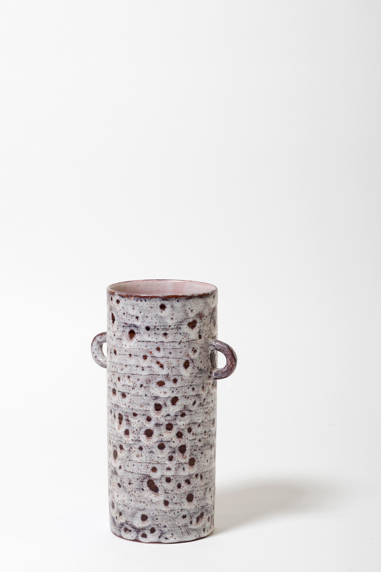 A polychrome ceramic vase, with handles
Monogrammed 'GJ, Vallauris'
Vallauris, France, circa 1950.