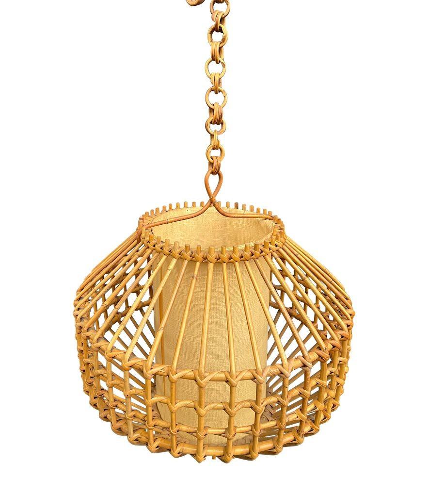 A French 1960s woven bamboo and parchment hanging light by Louis Sognot For Sale 1
