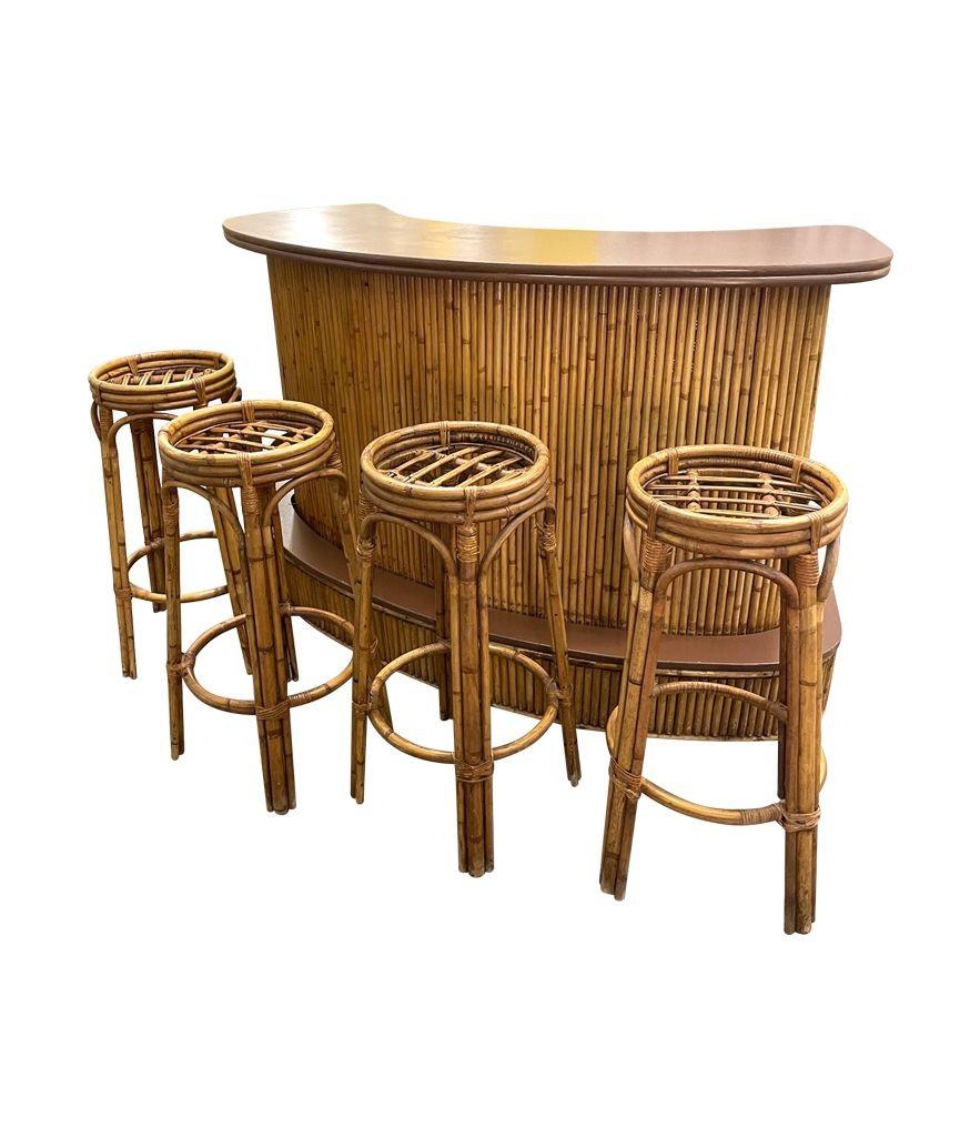 Bamboo A French 1970s bamboo bar with four orignal matching bamboo bar stools