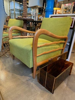 A French 1970s faux tortoiseshell and brass magazine rack by Mercier Freres