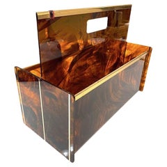 A French 1970s faux tortoiseshell and brass magazine rack by Mercier Freres