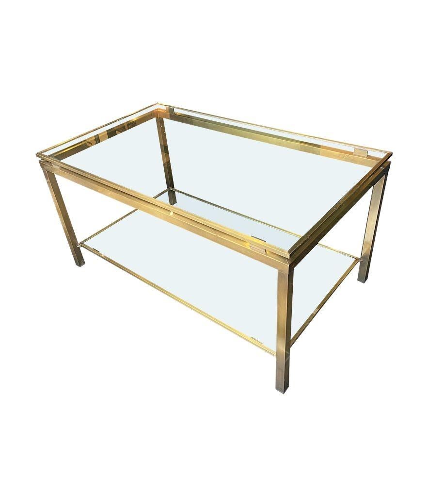 Mid-Century Modern A French 1970s gilt metal two tiered coffee table in the style of Guy Lefevre For Sale