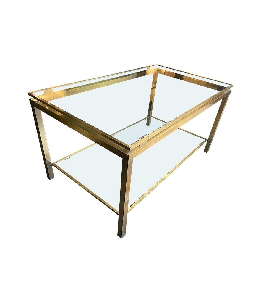 Metal A French 1970s gilt metal two tiered coffee table in the style of Guy Lefevre For Sale