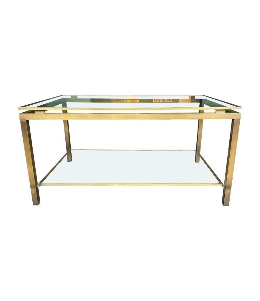 A French 1970s gilt metal two tiered coffee table in the style of Guy Lefevre For Sale 1