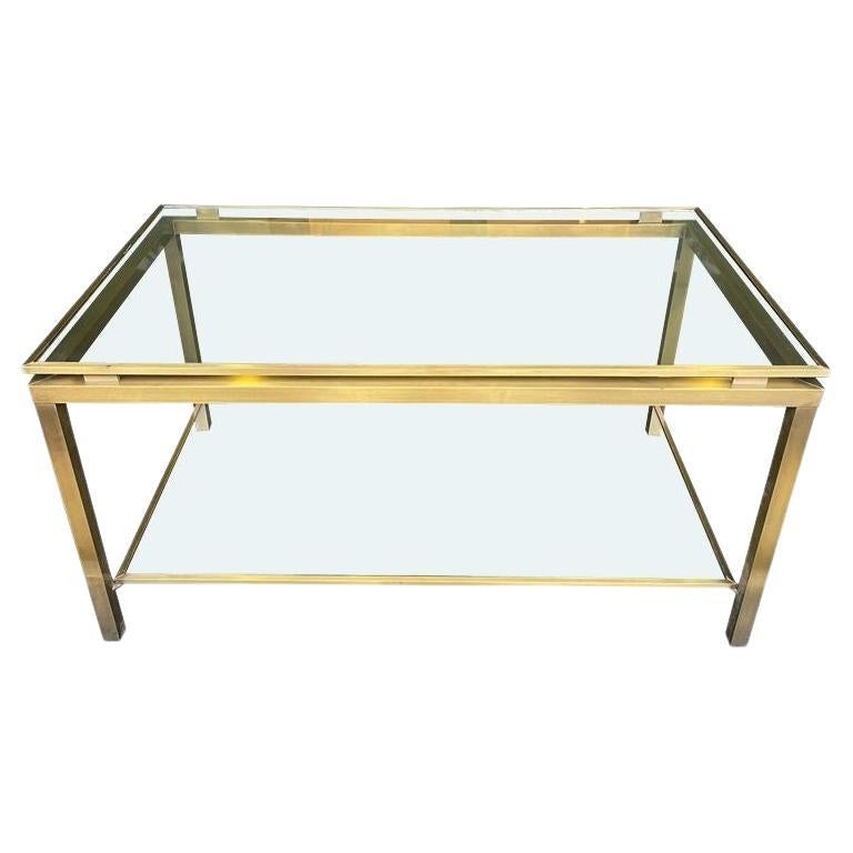 A French 1970s gilt metal two tiered coffee table in the style of Guy Lefevre For Sale