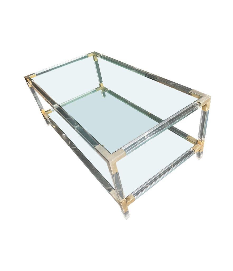 A French 1970s lucite and brass two tiered coffee table with glass plates 6