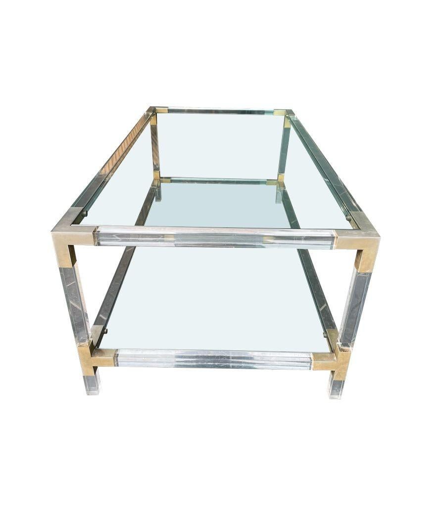 A French 1970s lucite and brass two tiered coffee table with glass plates 8