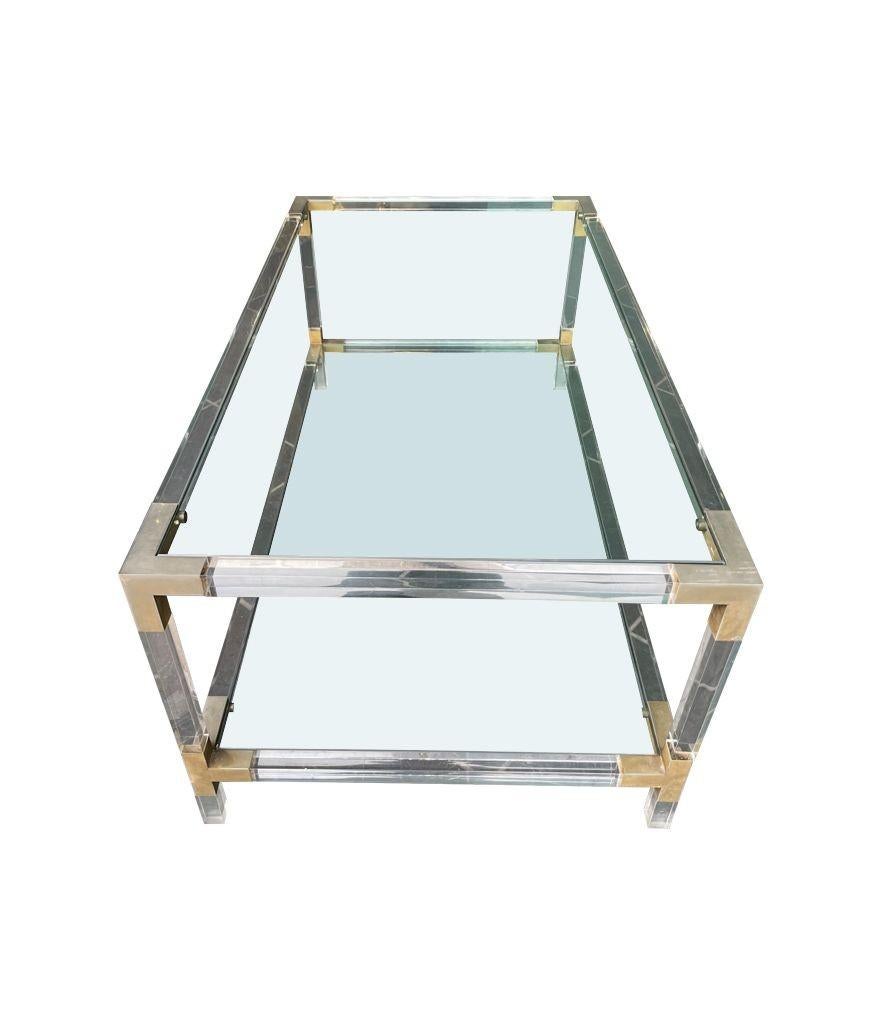 A French 1970s lucite and brass two tiered coffee table with glass plates For Sale 4