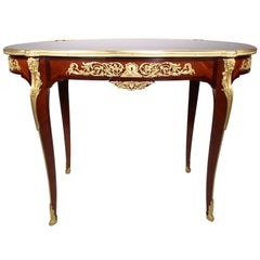 A French 19th/20th Century Louis XV Style Oval Gilt-Bronze Mounted Center Table