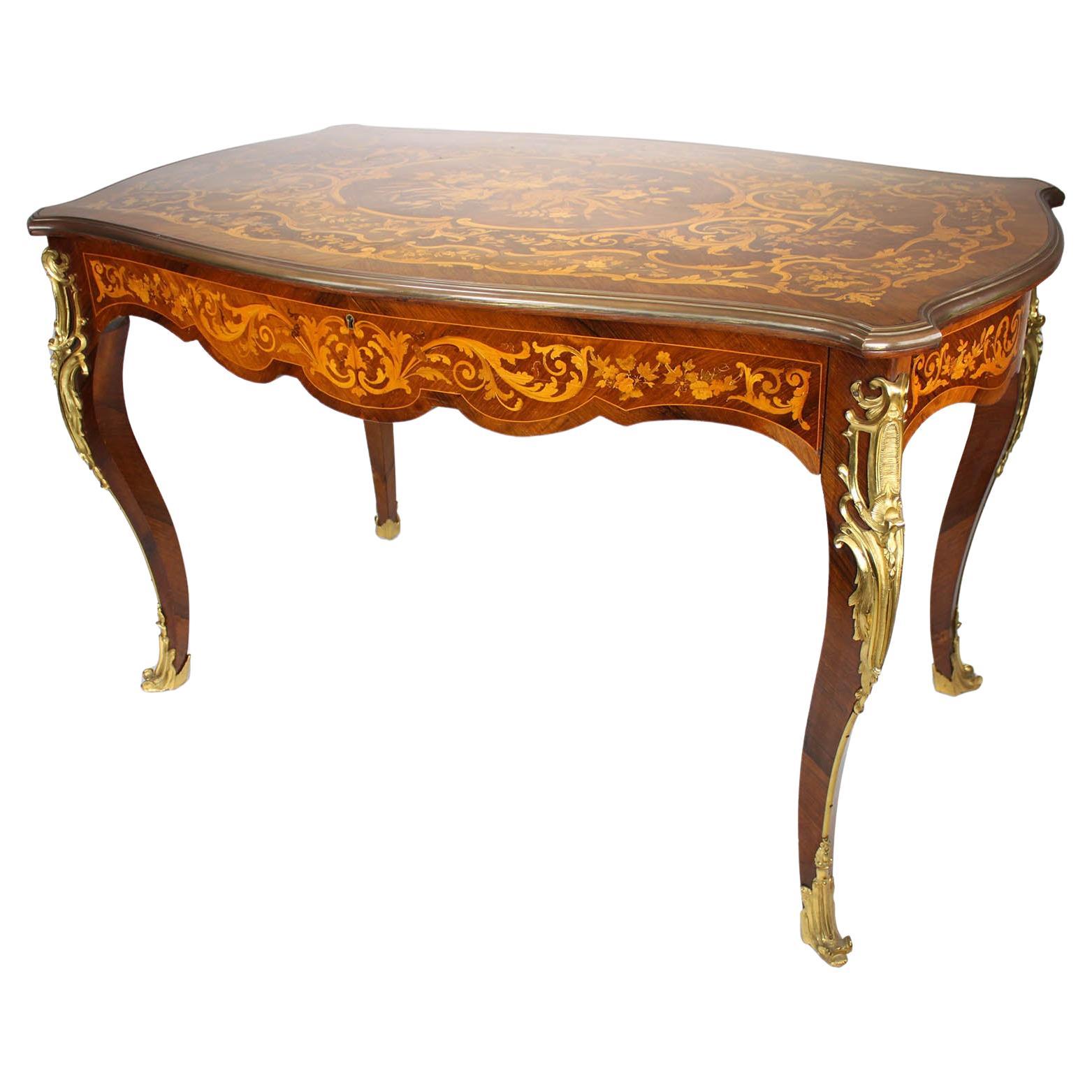 A French 19th/20th Century Louis XV Style Tulipwood Marquetry Writing Table/Desk For Sale