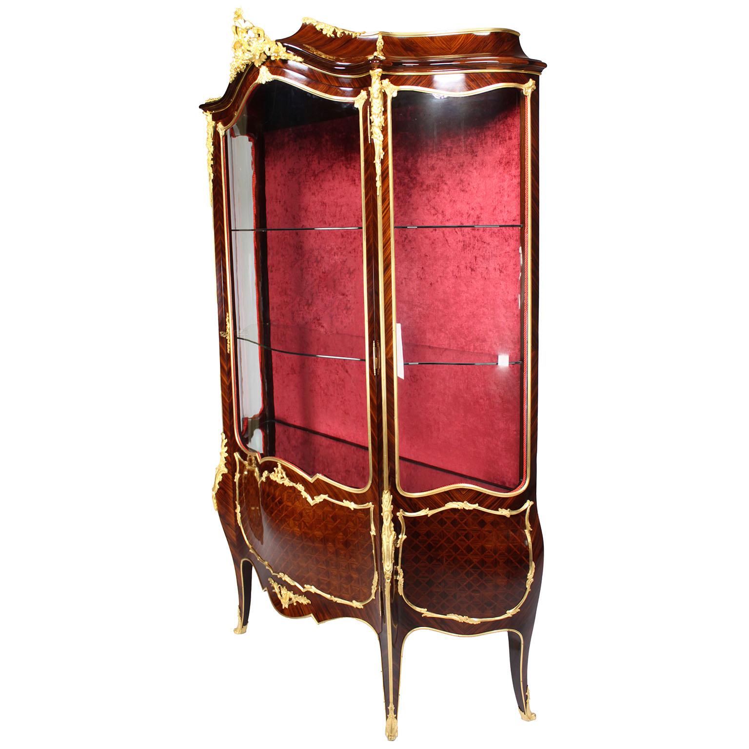 A Very Fine French 19th Century Louis XV Style 'Belle Époque' Ormolu Mounted and Kingwood Parquetry Single-Door Bombé Vitrine Display Cabinet,  by Alexandre Hugnet (French, active late 19th century), in the manner of François Linke (1855-1946). The