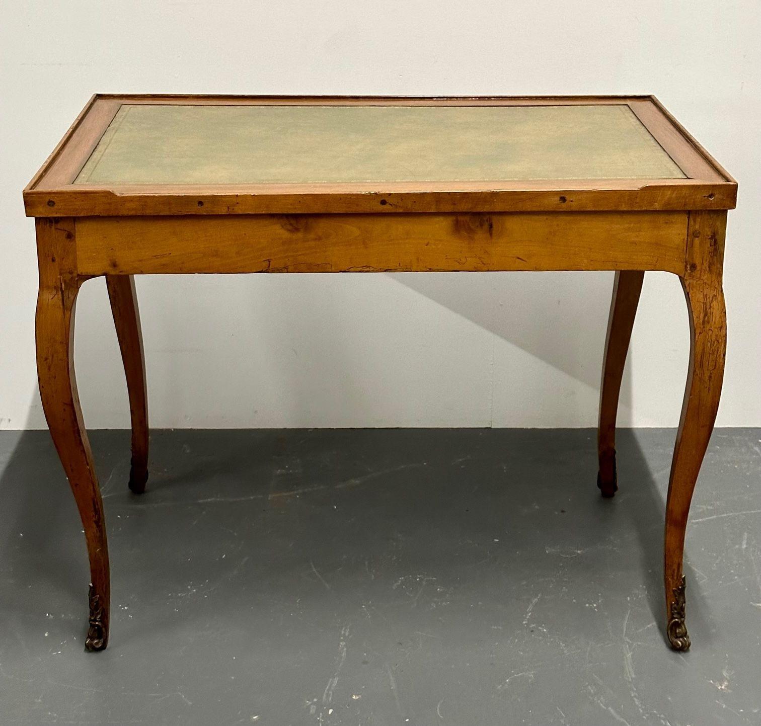 A French Tric-Trac Table, Antique Game / Backgammon Table, Leather Top
 
A Rare and Fine Late 18th Early 19th Century Games Table. Mortise and Tenon construction on this wonderful games table having a green gilt tooled leather top for card when