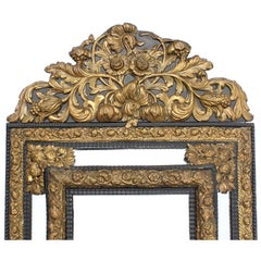A French 19th Century Baroque Style Hammered Gilt-Brass Repoussé Mirror Frame