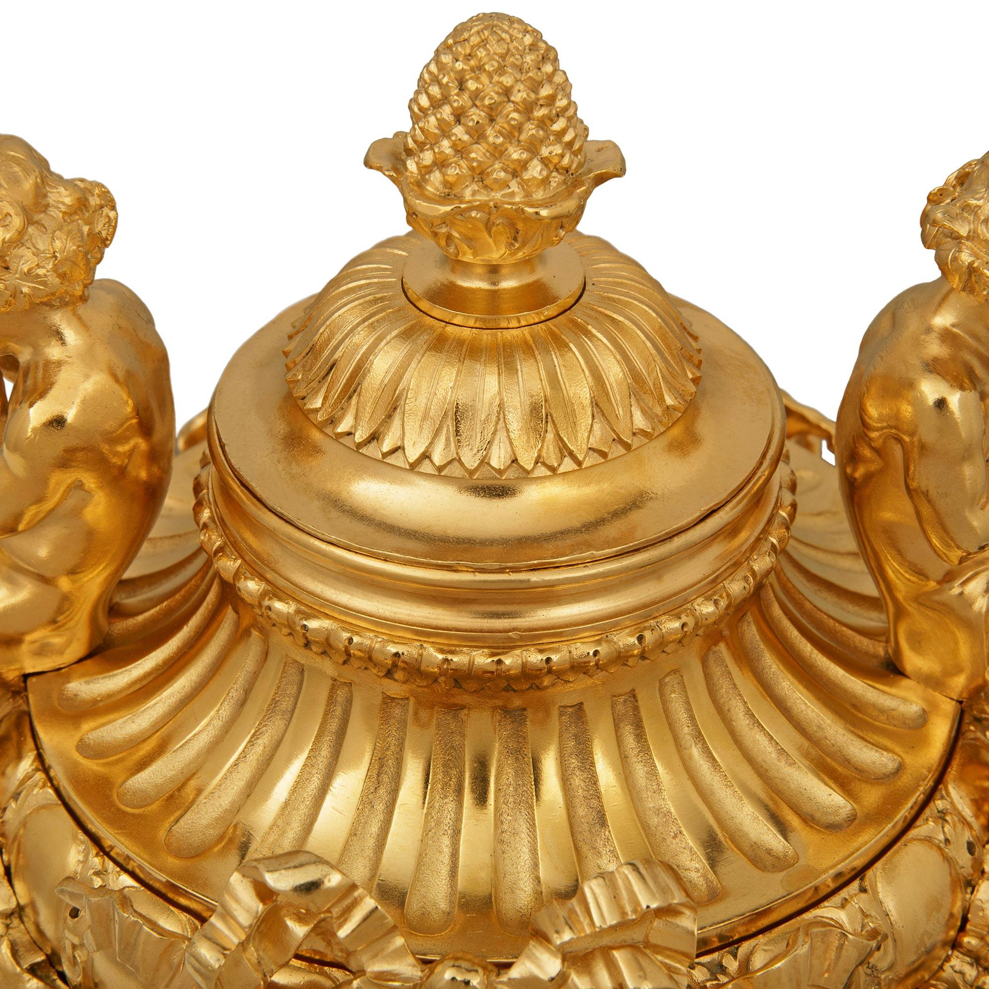 Bronze A French 19th century Belle Epoque Period marble and Ormolu clock garniture set For Sale