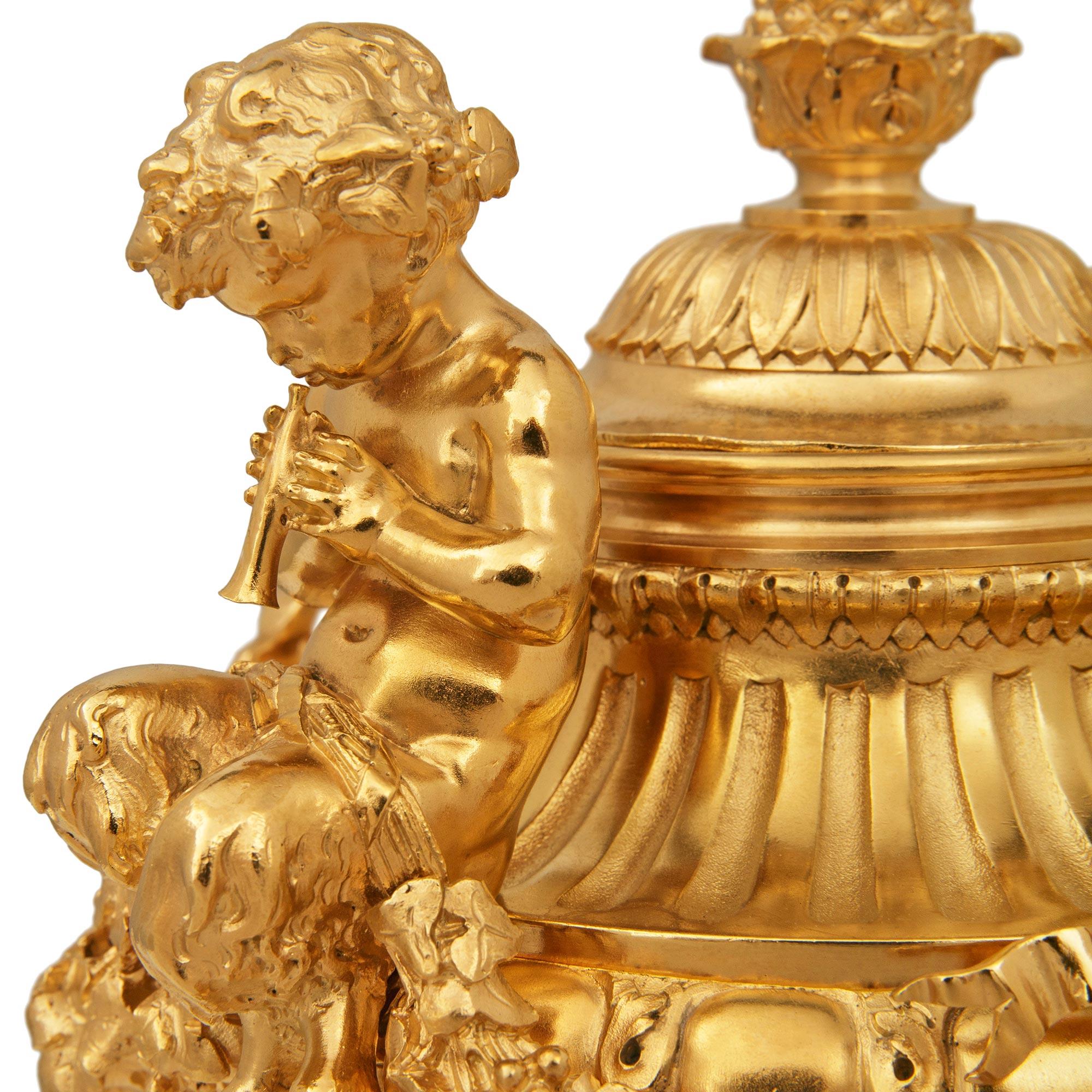 A French 19th century Belle Epoque Period marble and Ormolu clock garniture set For Sale 1