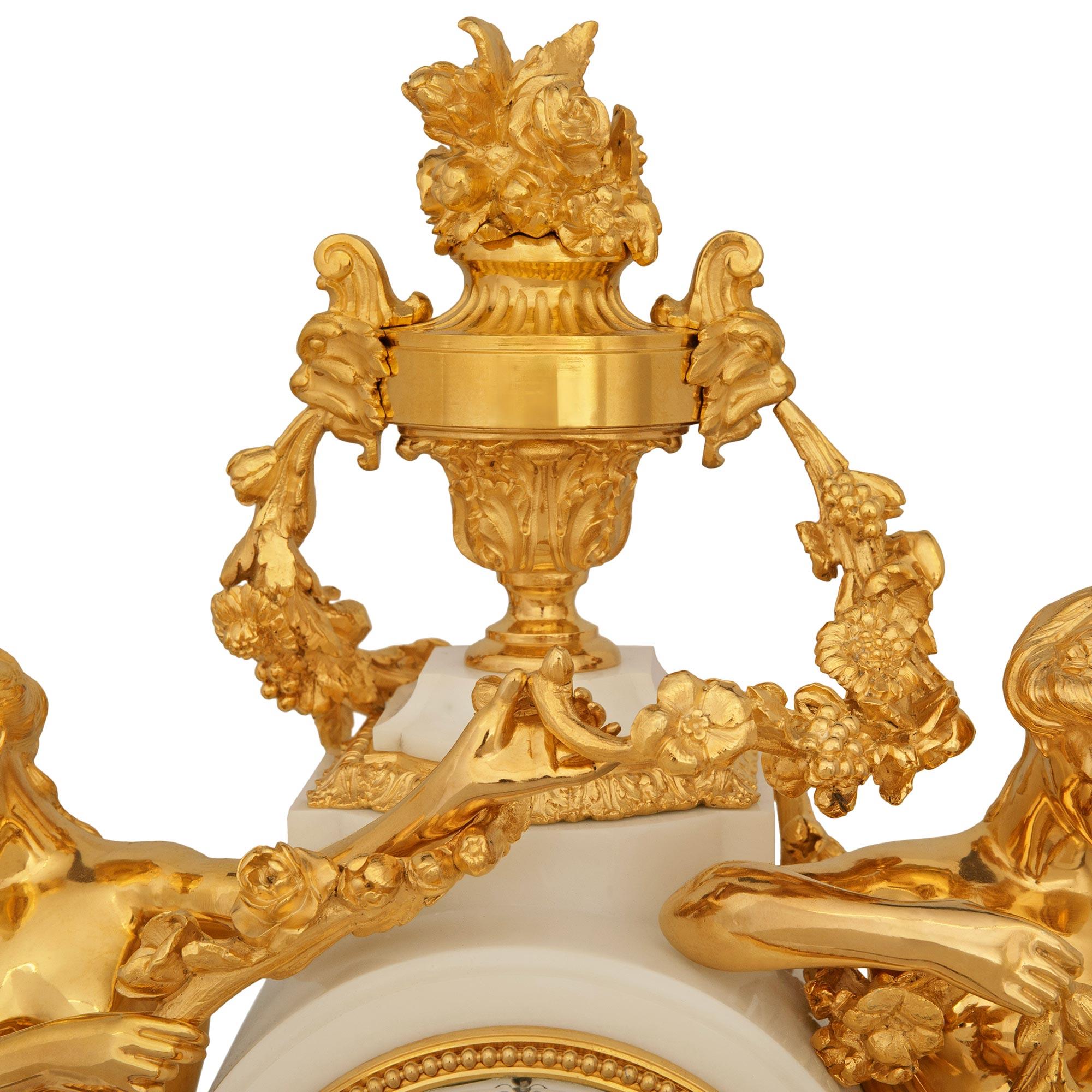 A French 19th century Carrara marble and Ormolu clock, by Mathieu Planchon For Sale 1