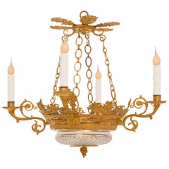 A French 19th century Charles X period ormolu and crystal chandelier