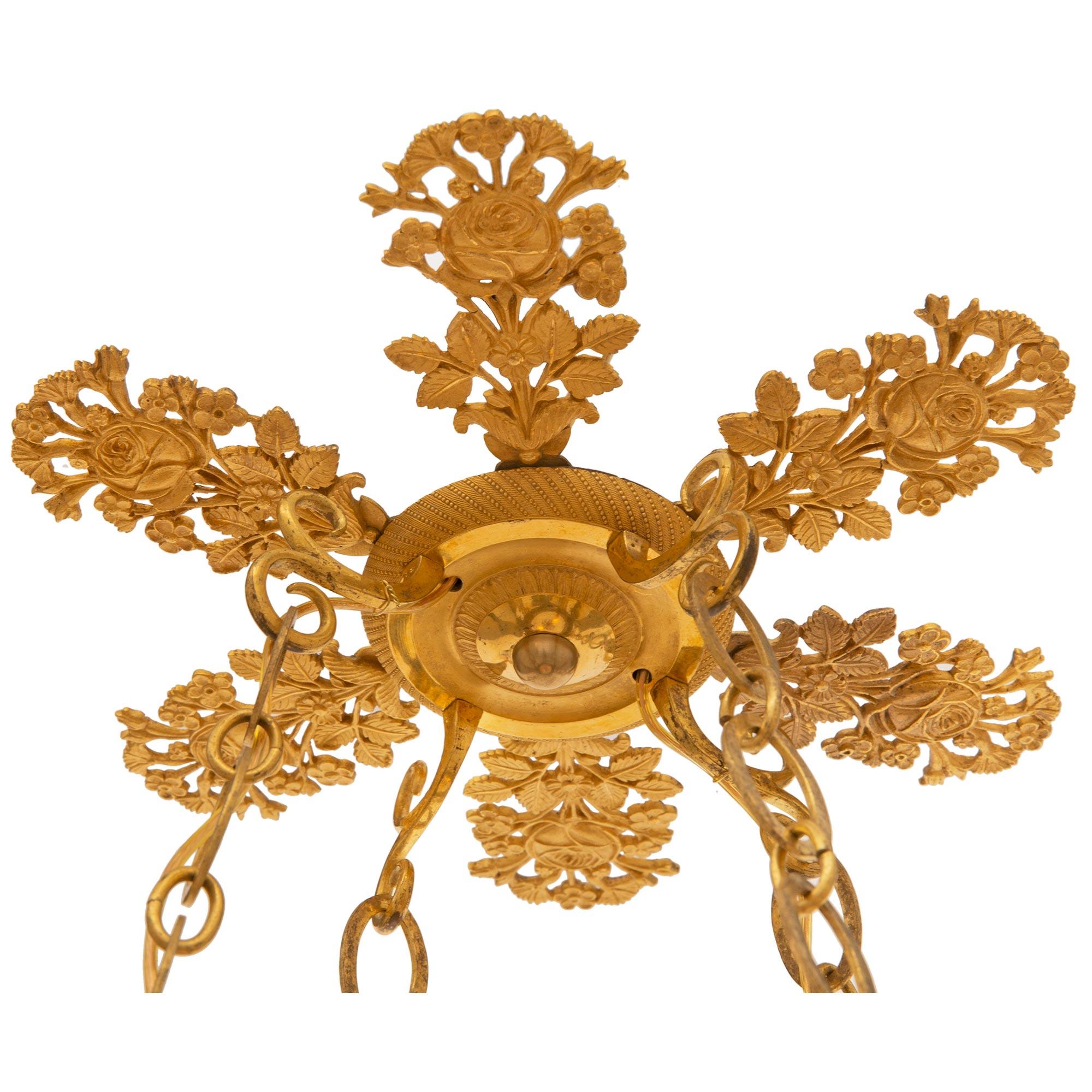 A French 19th century Charles X period ormolu and crystal chandelier In Good Condition For Sale In West Palm Beach, FL