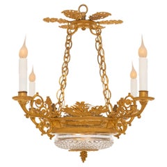 A French 19th century Charles X period ormolu and crystal chandelier
