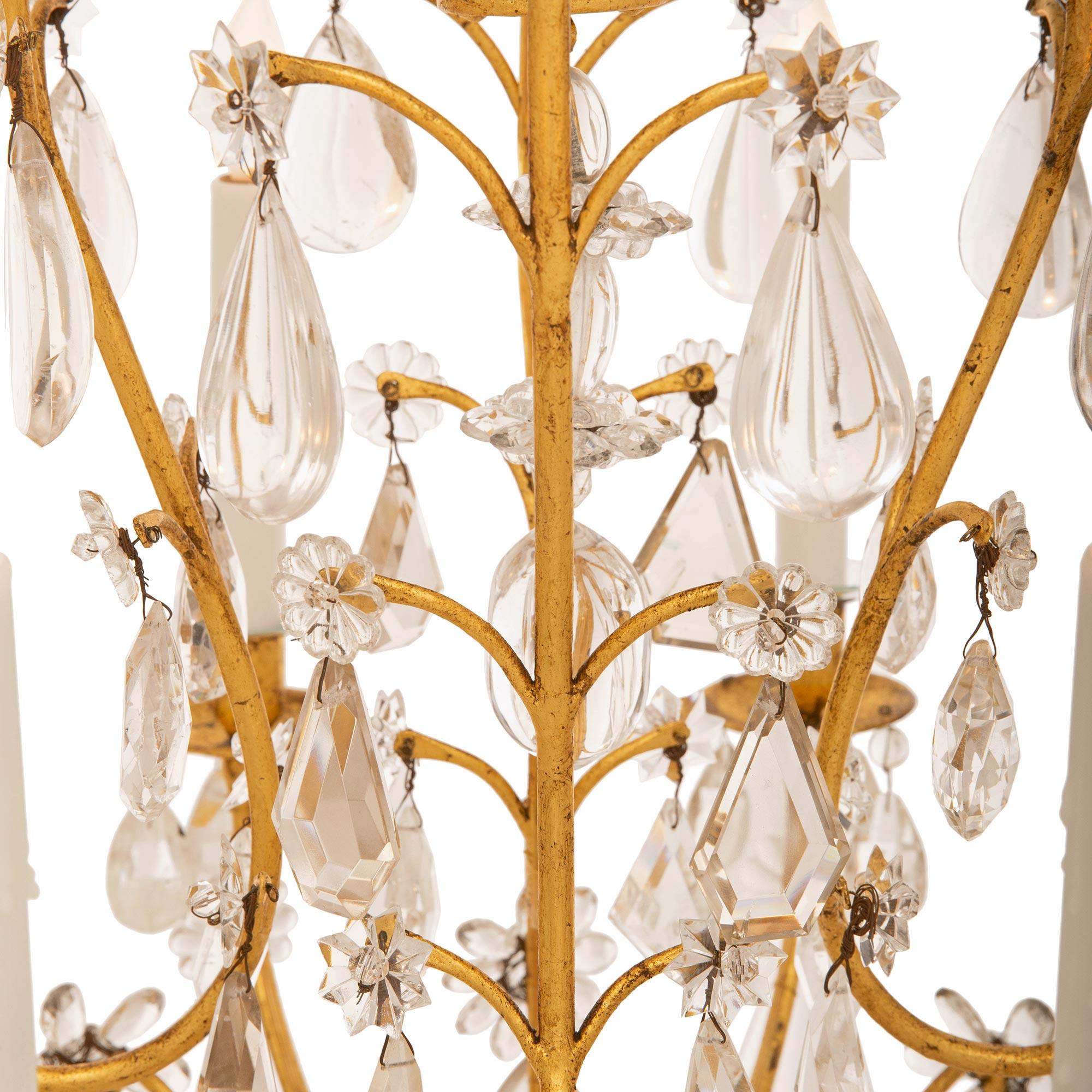 A French 19th century Gilt Iron, crystal and rock crystal chandelier In Good Condition For Sale In West Palm Beach, FL