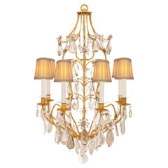Antique A French 19th century Gilt Iron, crystal and rock crystal chandelier