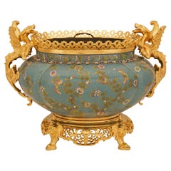 A French 19th century Japonisme st. Cloisonné and Ormolu planter/vase