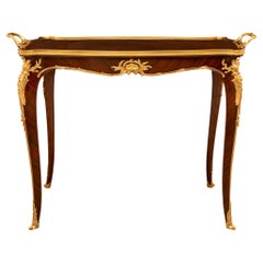 A French 19th century Louis XV st. coffee table attr to Francois Linke