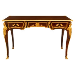 Bureau en bois de roi et bronze doré de style Louis XV du XIXe siècle
