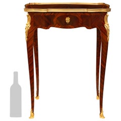 A French 19th century Louis XV st. Kingwood, Tulipwood, and Ormolu side table