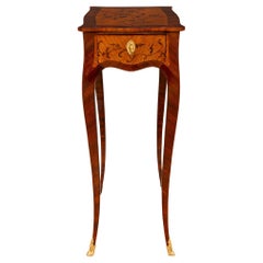 A French 19th century Louis XV st. Kingwood, Tulipwood and Ormolu side table