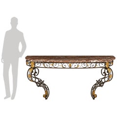 A French 19th century Louis XV st. Wrought Iron, Gilt Metal and Rouge Royale mar
