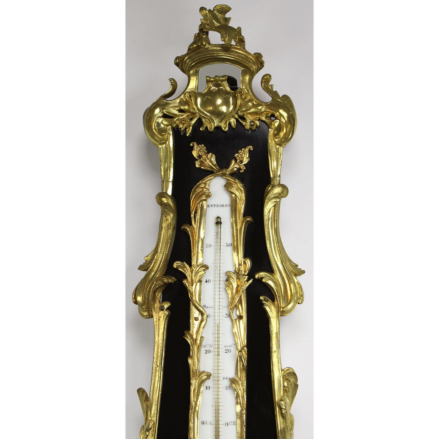 Porcelain French 19th Century Louis XV Style Gilt-Bronze and Ebonized Wood Wall Barometer For Sale