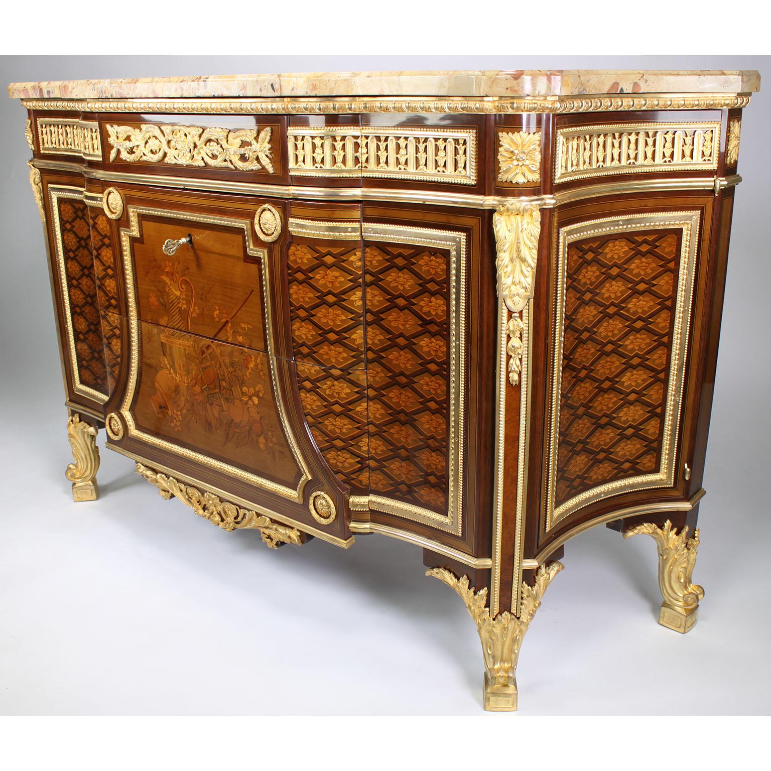 A Very Fine French 19th Century Louis XVI-Louis XVI Transition Style Ormolu-Mounted Mahogany, Birdseye Maple, Fruitwood and Sycamore Marquetry and Parquetry Commode with a Brèche d'Alep Marble-Top, after the model by Jean-Henri Riesener (1734-1806).