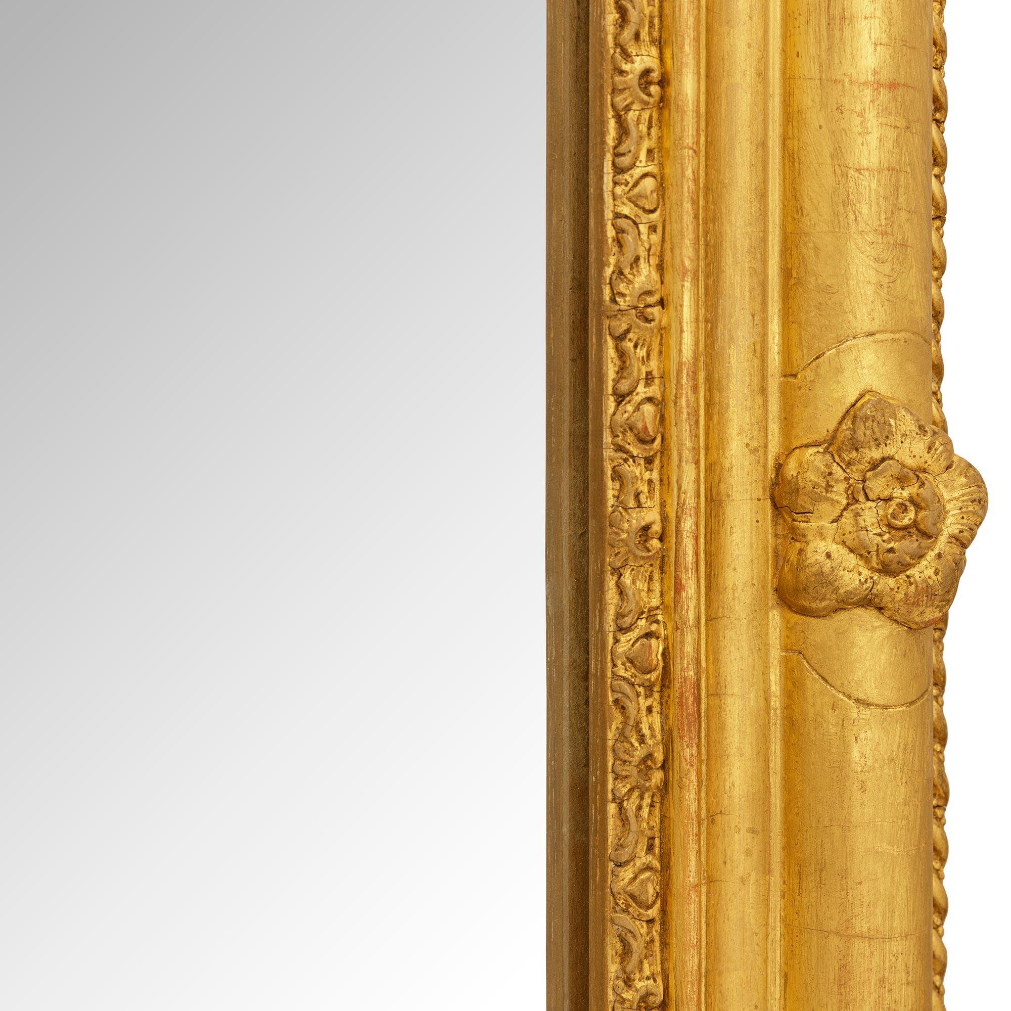 19th Century A French 19th century Louis XV/XVI st. Giltwood mirror For Sale