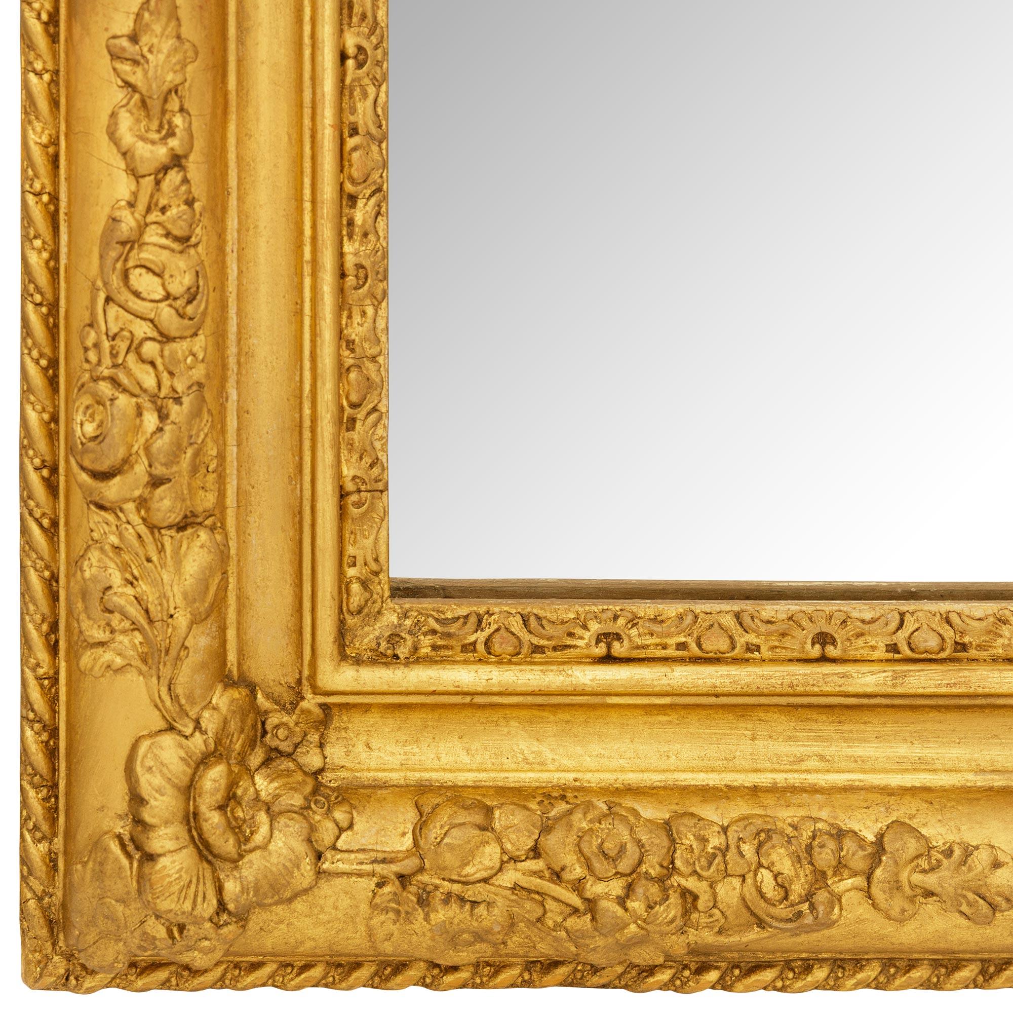 A French 19th century Louis XV/XVI st. Giltwood mirror For Sale 1