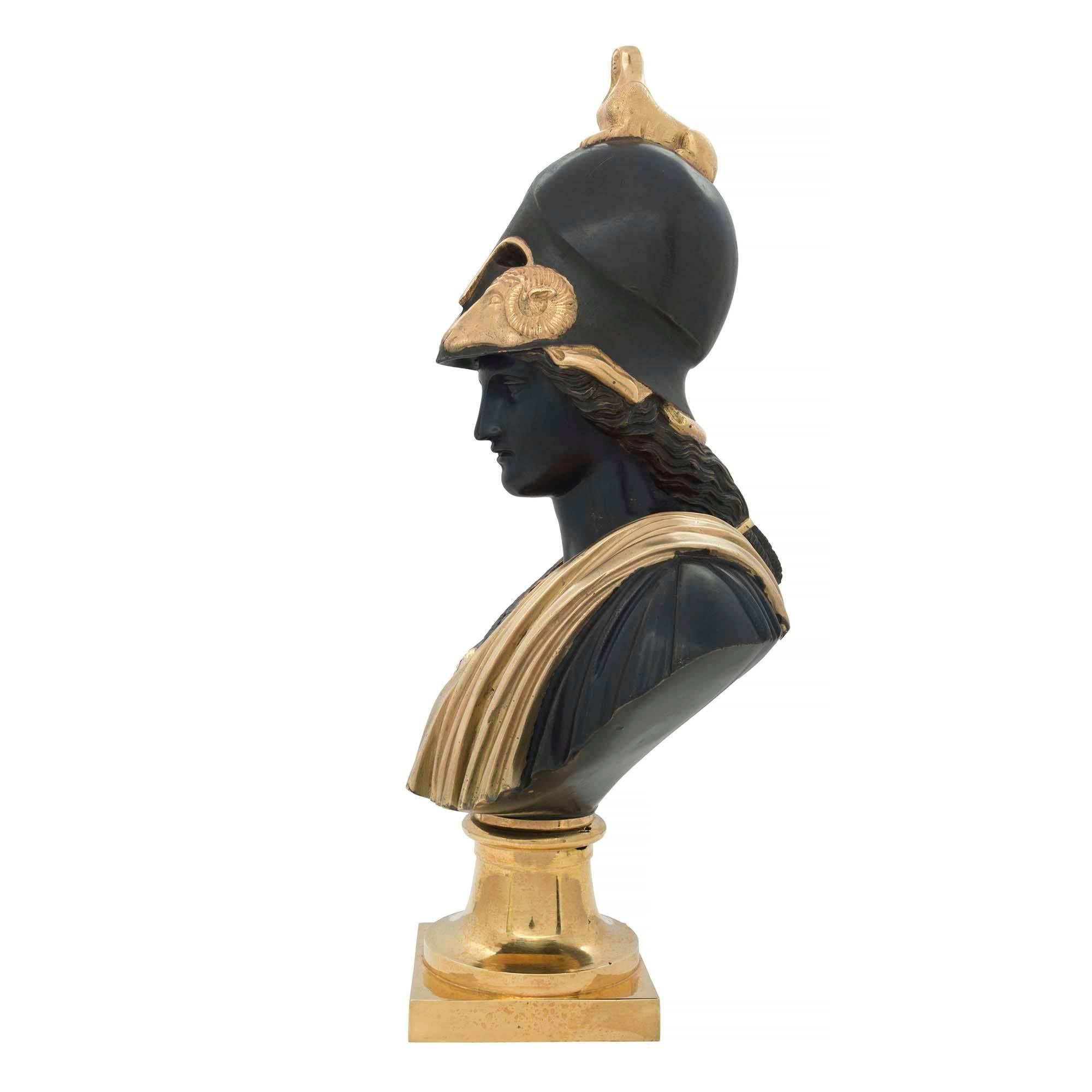 A striking French 19th century Louis XVI style patinated and ormolu bust of Pericles. The bust is raised by a square ormolu base below the socle. Pericles is dressed in his formal armor with a draped wrap on his shoulder. The young Pericles is also