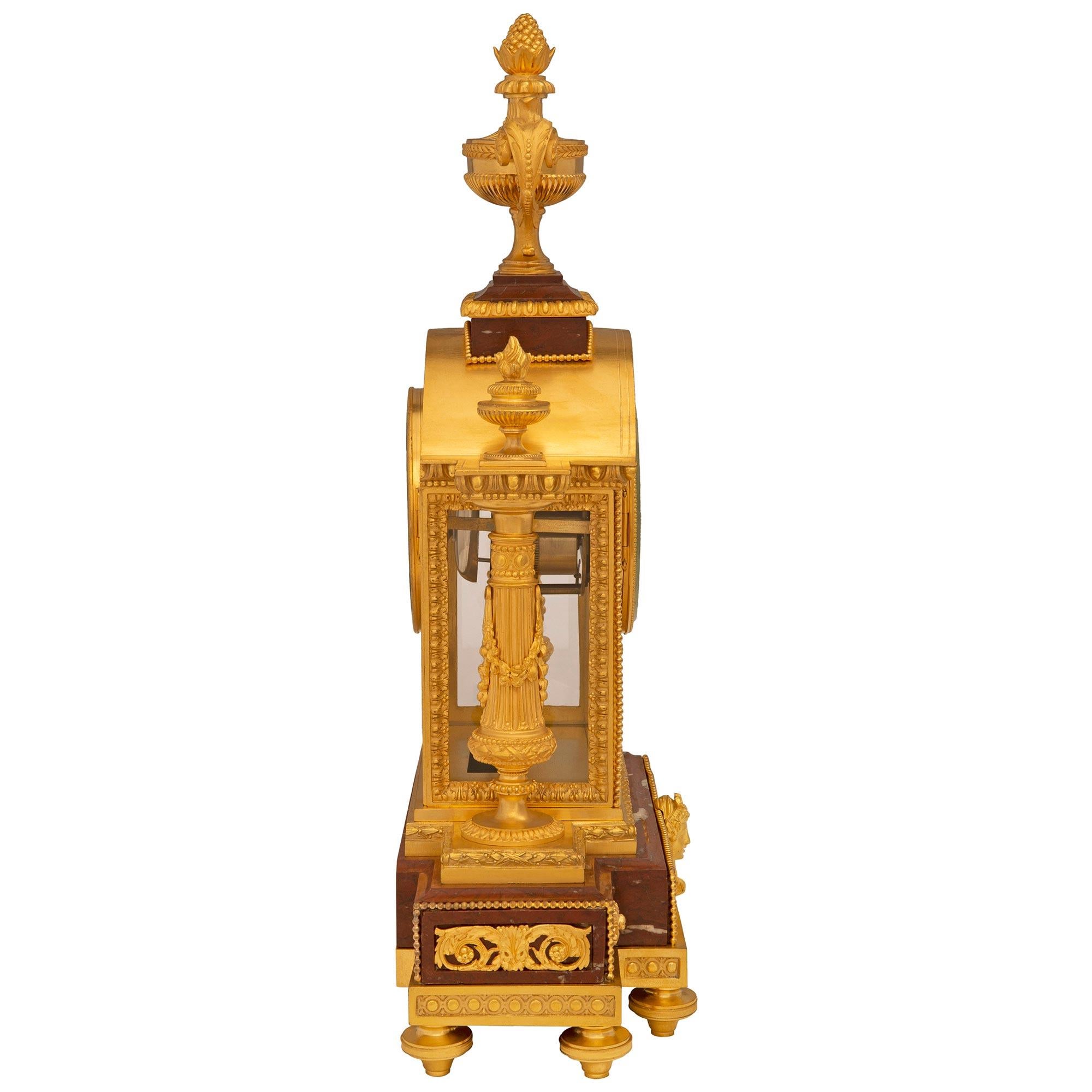 A French 19th century Louis XVI st. clock signed Le Merle Charpentier Bronzier In Good Condition For Sale In West Palm Beach, FL