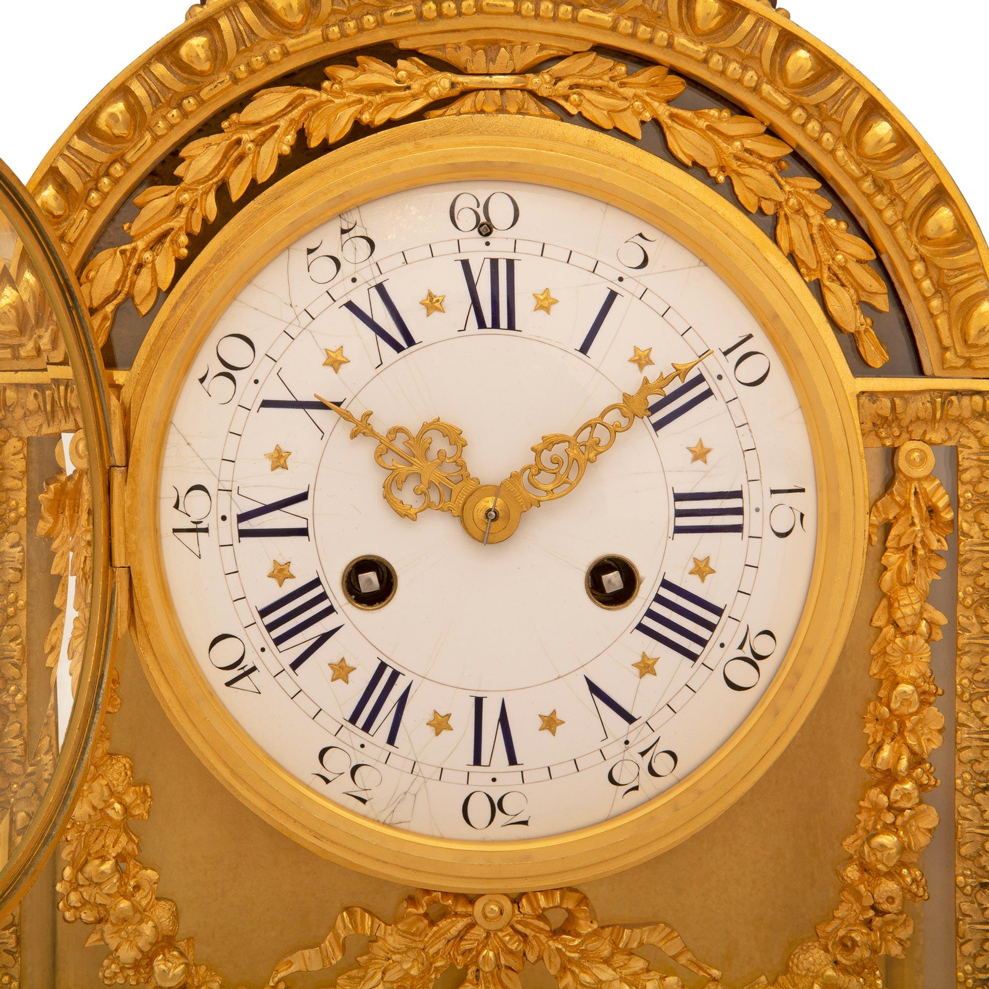 A French 19th century Louis XVI st. clock signed Le Merle Charpentier Bronzier  For Sale 1