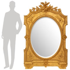 A French 19th century Louis XVI st. giltwood mirror