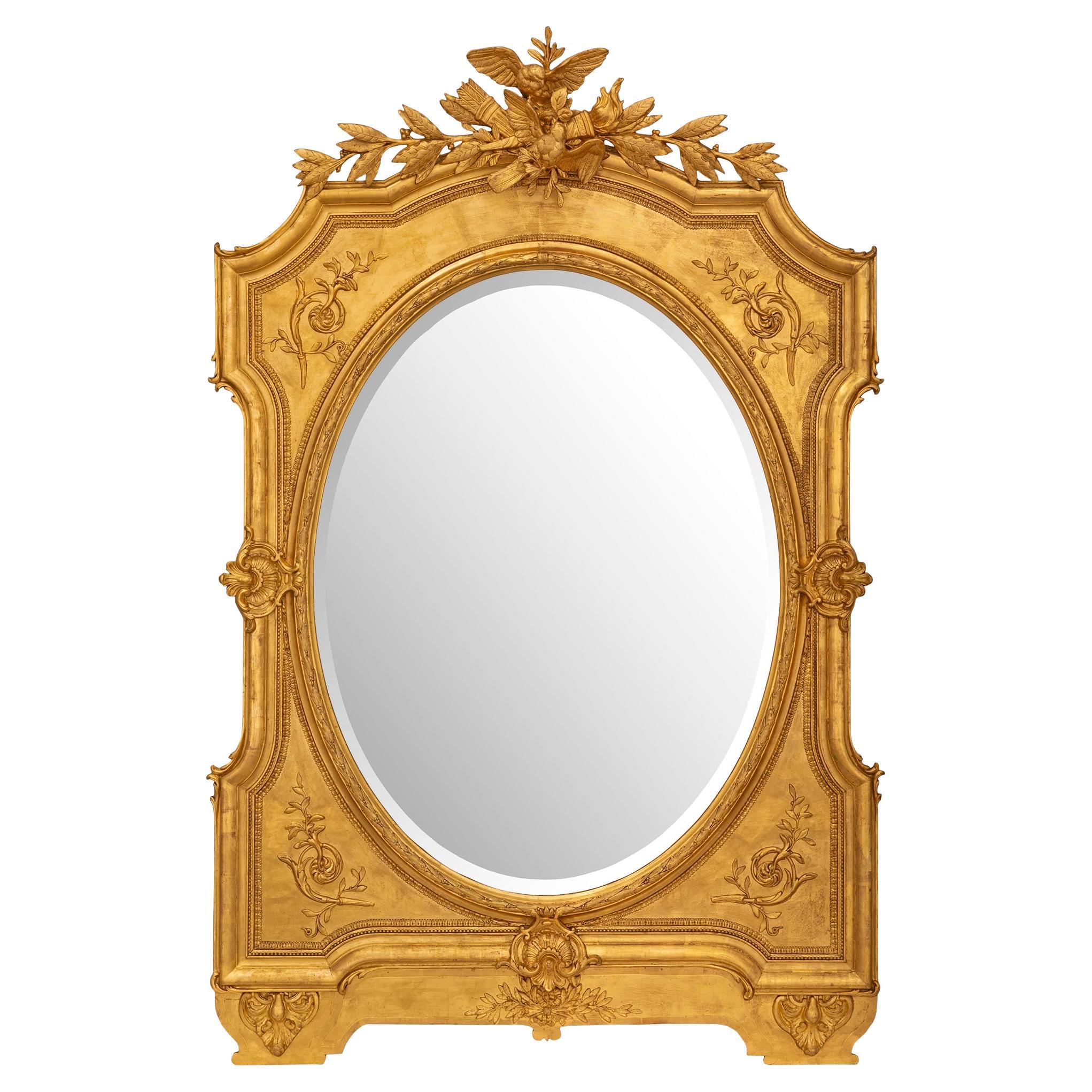 Miroir en bois doré de style Louis XVI du XIXe siècle en vente