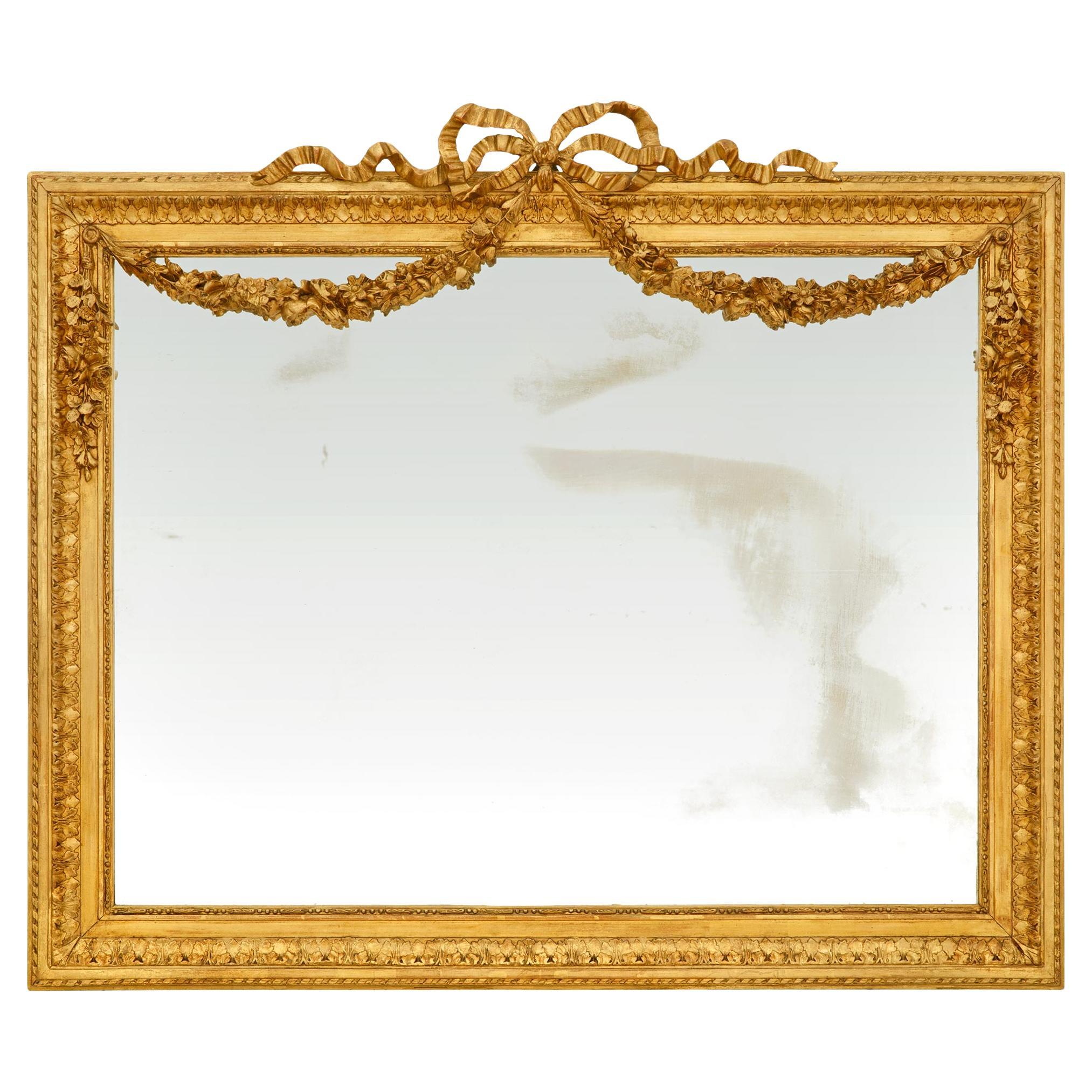 A French 19th century Louis XVI st. Giltwood mirror
