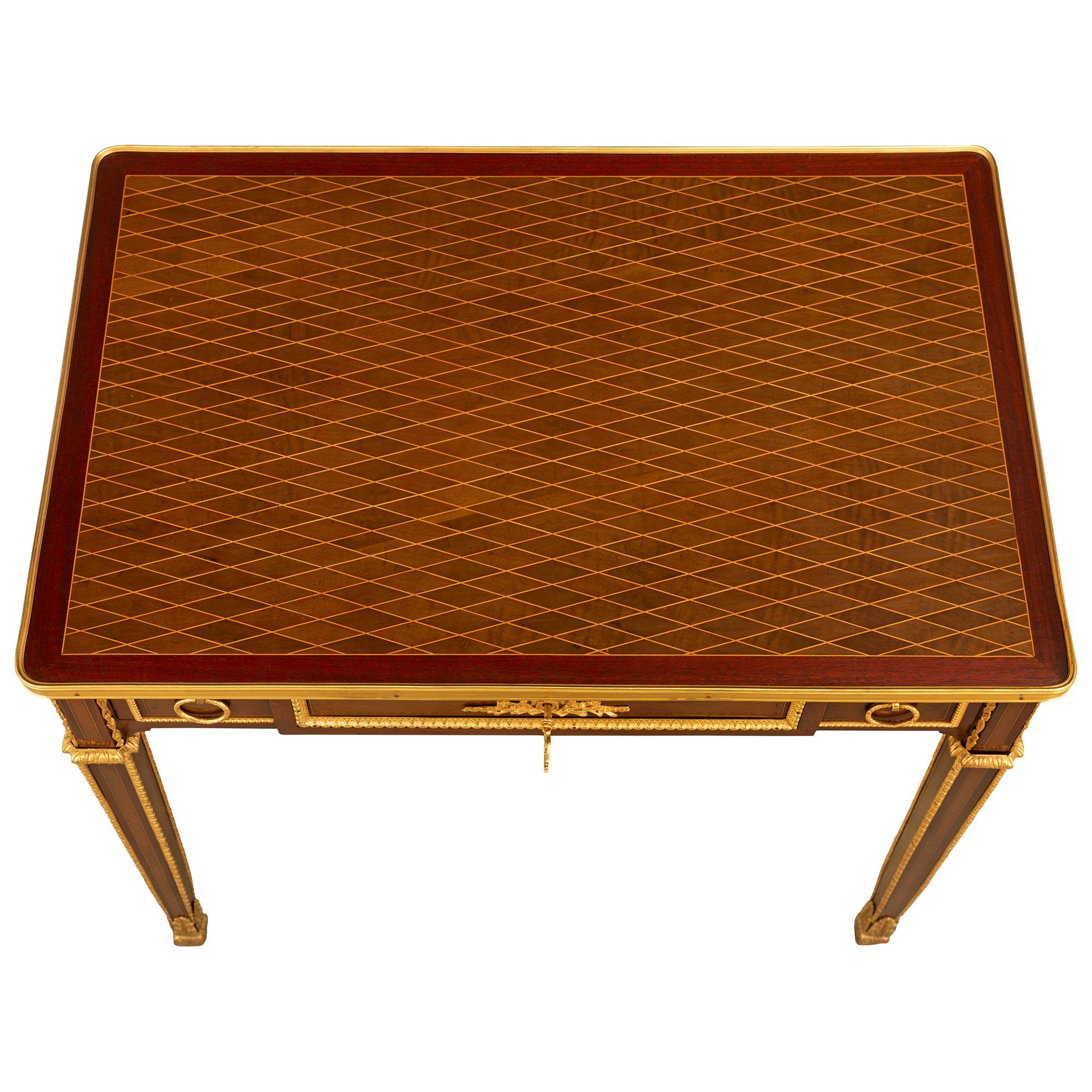 A French 19th century Louis XVI st. Mahogany, Maple and Amarante side table For Sale 7