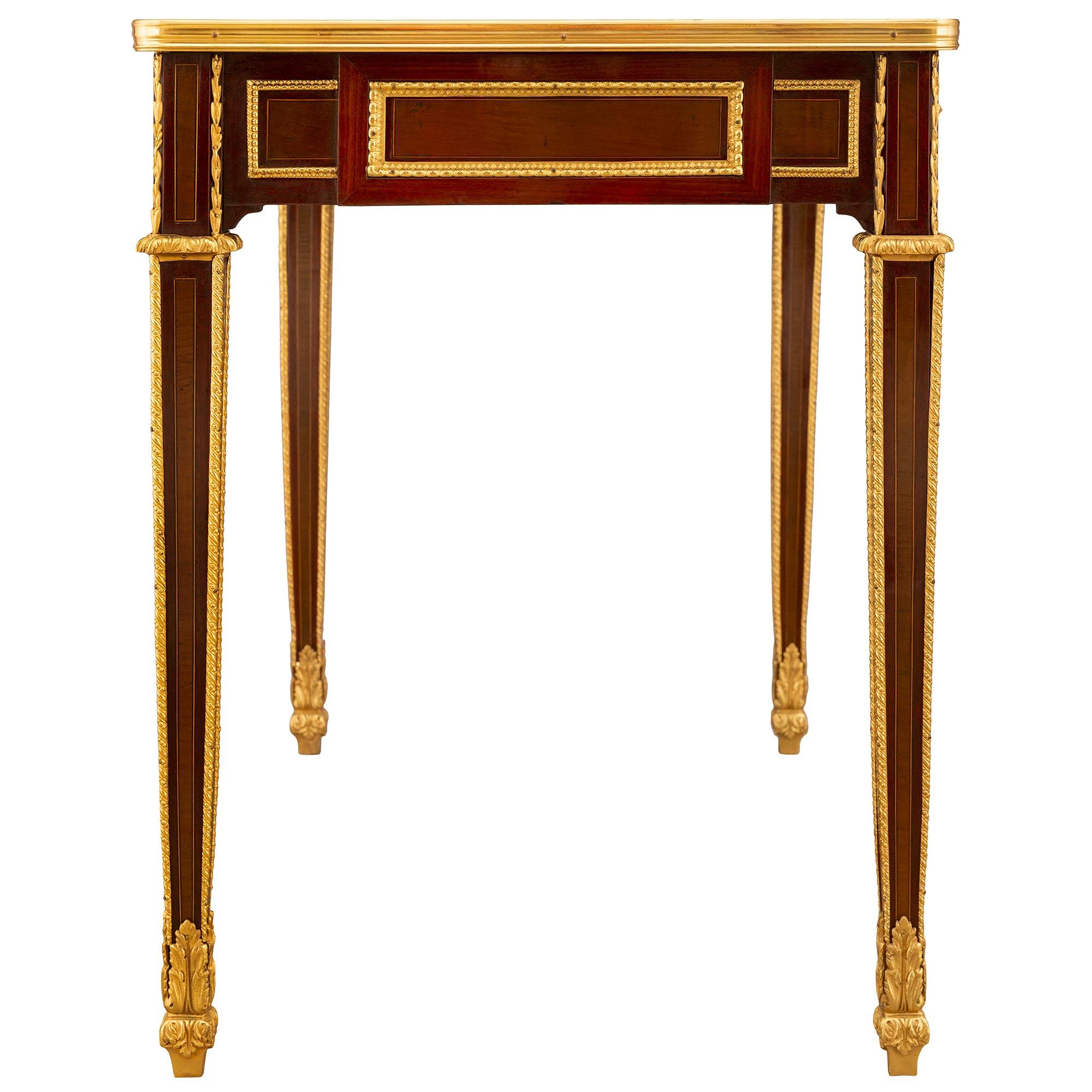 A French 19th century Louis XVI st. Mahogany, Maple and Amarante side table For Sale 2