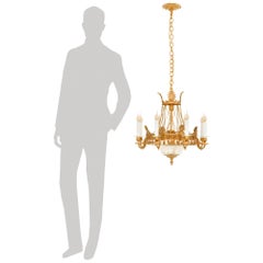A French 19th century Louis XVI st. Ormolu and Baccarat Crystal chandelier