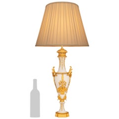 A French 19th century Louis XVI st. Ormolu and Biscuit Porcelain lamp