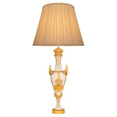 A French 19th century Louis XVI st. Ormolu and Biscuit Porcelain lamp