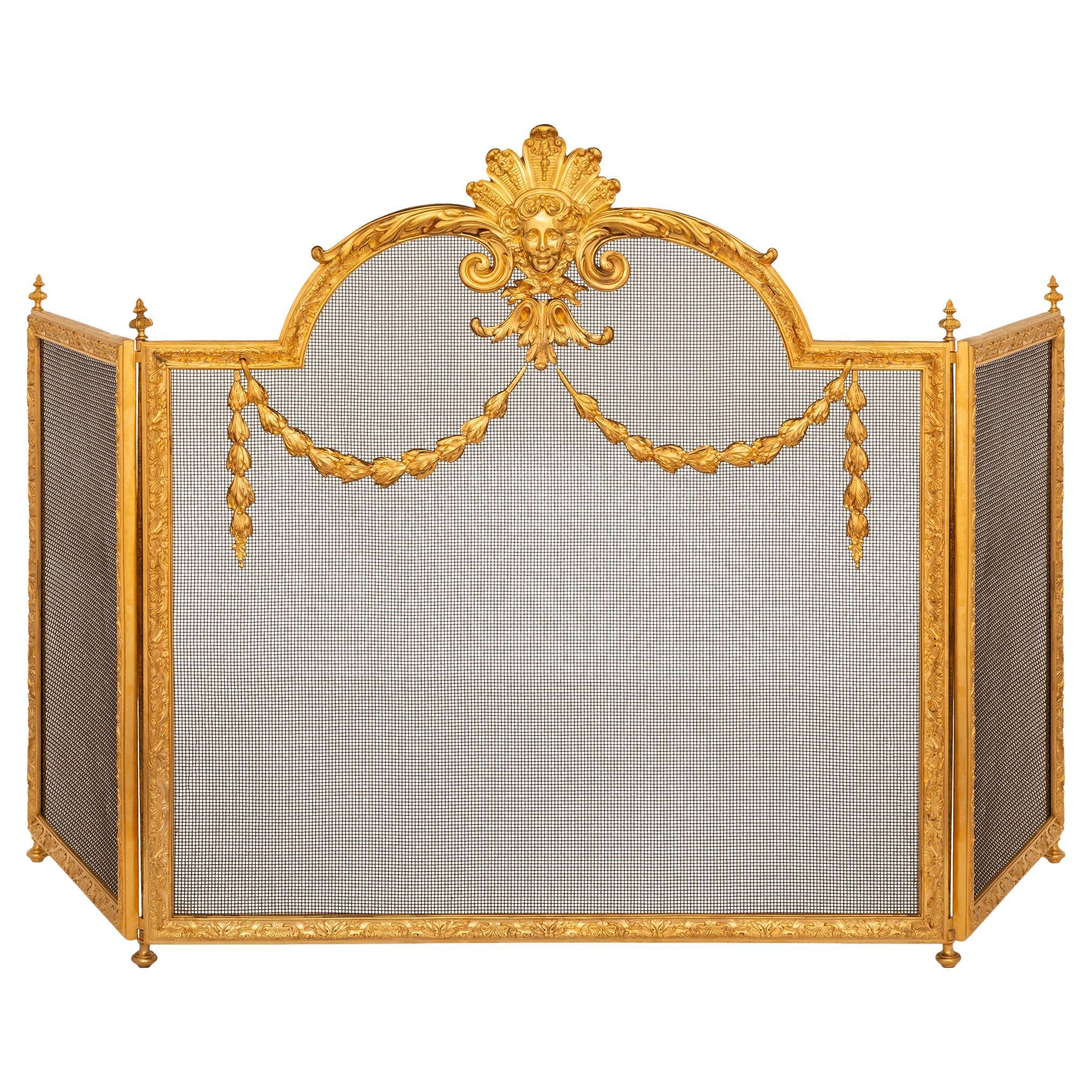 A French 19th century Louis XVI st. Ormolu fire screen